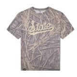 Mississippi State Script Mossy Oak Tee, cream print on Mossy Oak Shadow Grass